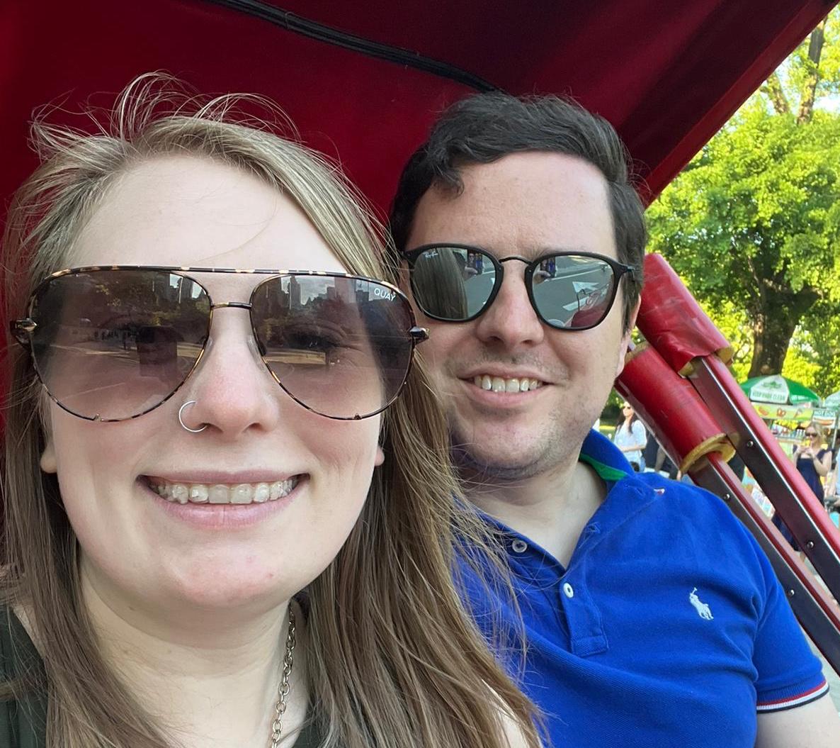 matt and kristi in a carriage